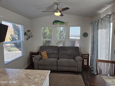 This very clean 2018 Park Model Home is move in readye and live