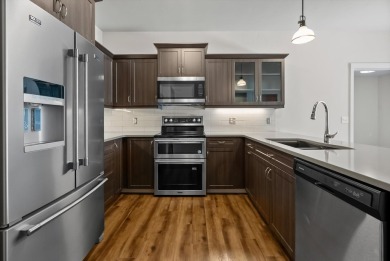 Enjoy effortless living in this beautifully designed corner unit