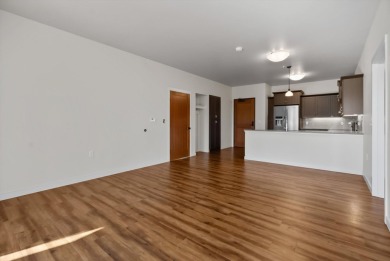 Enjoy effortless living in this beautifully designed corner unit