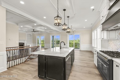 This exceptional new construction in Mariners Pointe blends