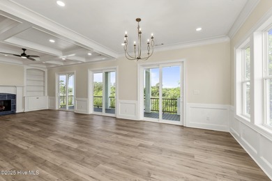 This exceptional new construction in Mariners Pointe blends