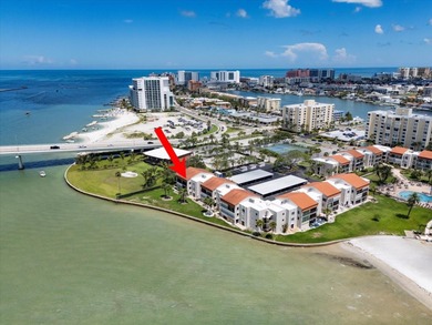 Breathtaking Beach access oversized waterfront condo located in
