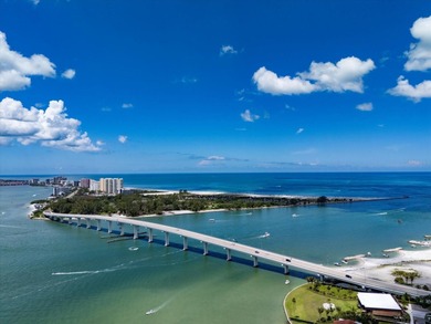 Breathtaking Beach access oversized waterfront condo located in