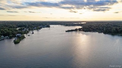 Set on over two acres along the coveted shores of all-sports