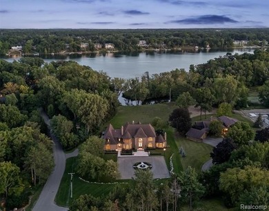 Set on over two acres along the coveted shores of all-sports