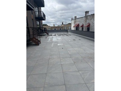 Introducing 3204 Kostner - LAST TERRACE UNIT REMAINING! Unit 205