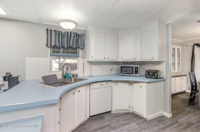Beautifully updated manufactured home located in a desirable 55