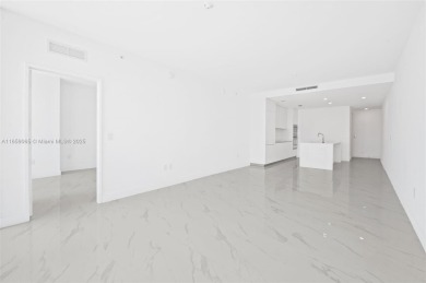 Experience luxury living at Aria Reserve in this 3-bedroom, 3