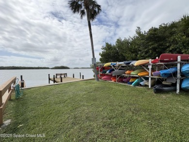 Wake up to gorgeous river views in this bright and breezy