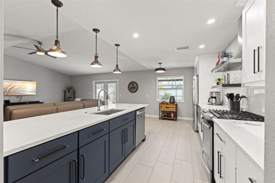 Welcome home to 2420 Osprey Ave, Palm Harbor, FL 34683. Totally