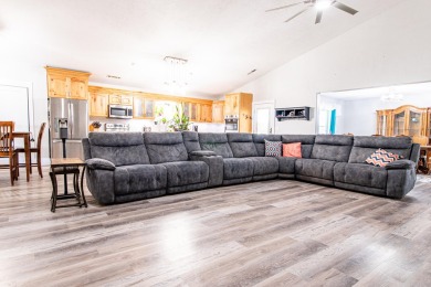 Welcome to this stunning 3,887 sq. ft. estate on .94 acres of