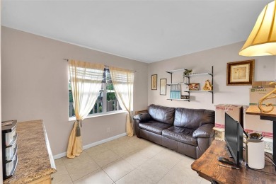 Welcome to this bright and spacious third-floor condo in a