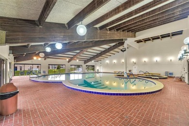 Welcome to this bright and spacious third-floor condo in a