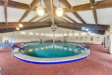 Welcome to this bright and spacious third-floor condo in a