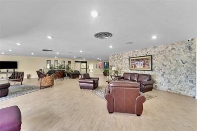 Welcome to this bright and spacious third-floor condo in a