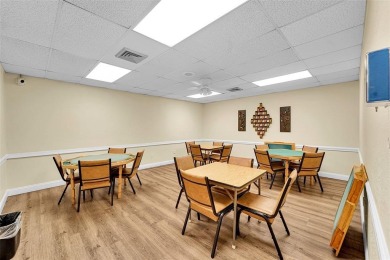 Welcome to this bright and spacious third-floor condo in a