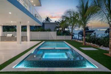 BRAND NEW CONSTRUCTION WITH BAY VIEWS! Welcome to a stunning new