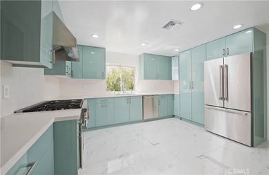 Welcome to this beautifully updated, high-end condo featuring an