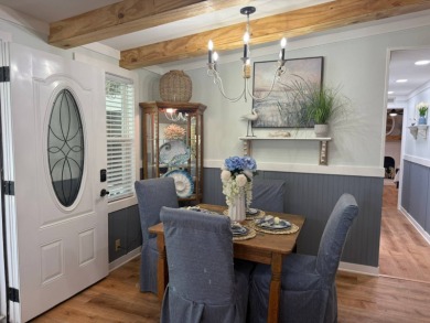 This magnificent double-wide mobile home in the desirable