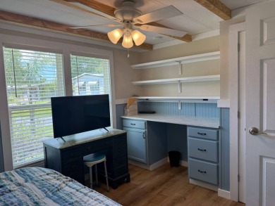 This magnificent double-wide mobile home in the desirable