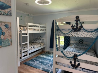 This magnificent double-wide mobile home in the desirable