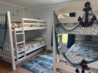 This magnificent double-wide mobile home in the desirable