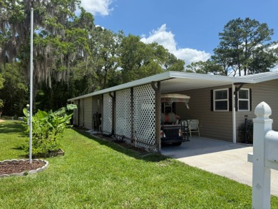 This magnificent double-wide mobile home in the desirable