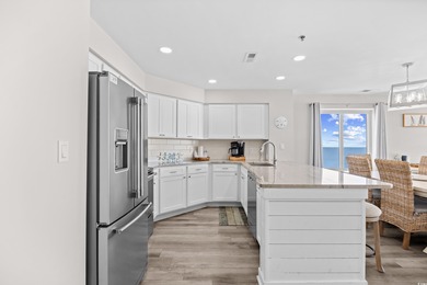 Wake up to the sound of waves and endless ocean views from this