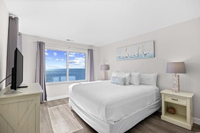 Wake up to the sound of waves and endless ocean views from this