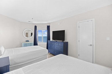 Wake up to the sound of waves and endless ocean views from this