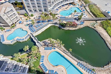 Wake up to the sound of waves and endless ocean views from this