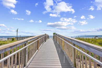 Wake up to the sound of waves and endless ocean views from this