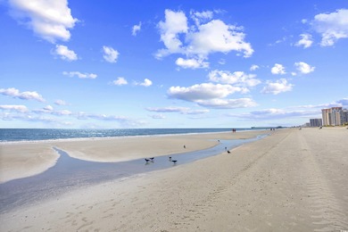 Wake up to the sound of waves and endless ocean views from this