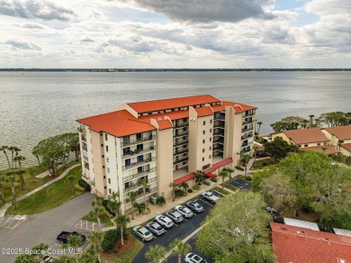 Step into this COMPLETELY RENOVATED riverfront condo & enjoy