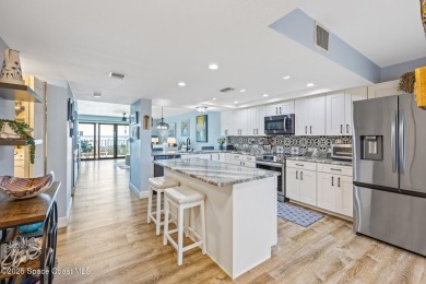 Step into this COMPLETELY RENOVATED riverfront condo & enjoy