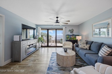 Step into this COMPLETELY RENOVATED riverfront condo & enjoy