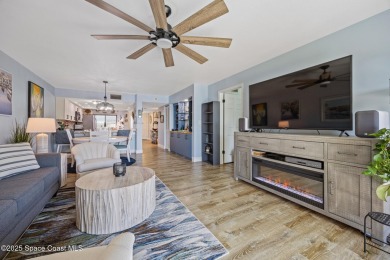 Step into this COMPLETELY RENOVATED riverfront condo & enjoy