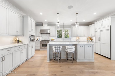 Welcome to this stunning residence in the highly sought after