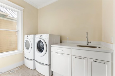 Welcome to this stunning residence in the highly sought after