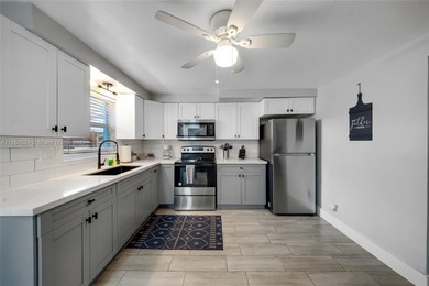 This charming 3-bedroom, 2-bath single-family home as well as a