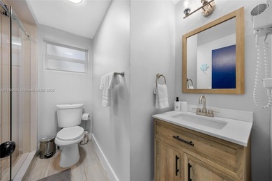 This charming 3-bedroom, 2-bath single-family home as well as a