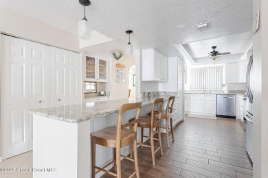 This 7th floor gated community offers breathtaking river views