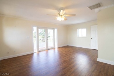 Experience coastal living at its finest with this exceptional