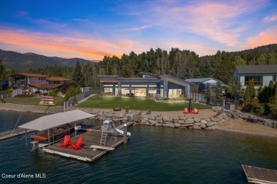 This nearly new, custom-built 4,534 SF waterfront estate along