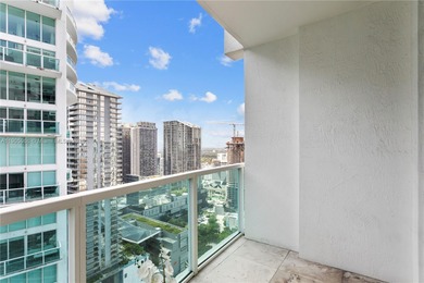 Experience elevated Brickell living in this sun-filled 3-bedroom