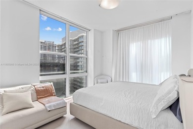 Experience elevated Brickell living in this sun-filled 3-bedroom
