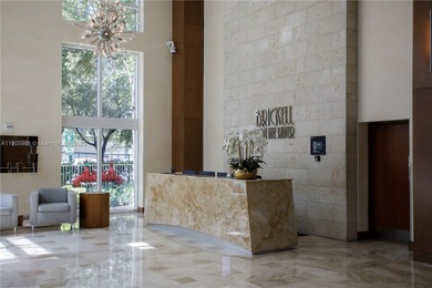 Experience elevated Brickell living in this sun-filled 3-bedroom