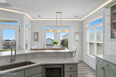 Beautifully updated coastal retreat just steps from the beach