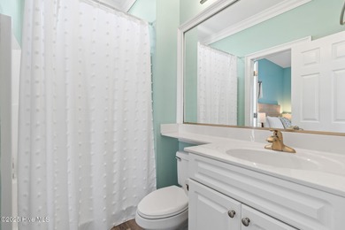 Beautifully updated coastal retreat just steps from the beach