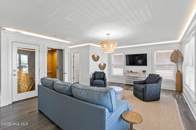 Beautifully updated coastal retreat just steps from the beach